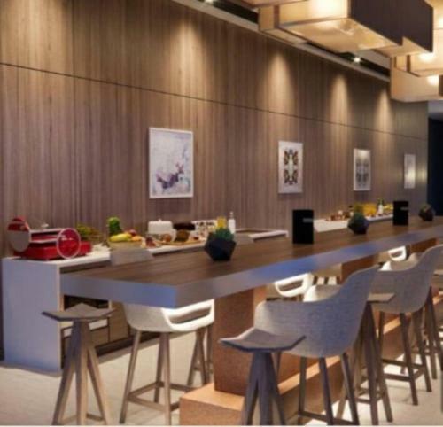 Grand Marina/ Apartasuite Servicios Hotel Marriot