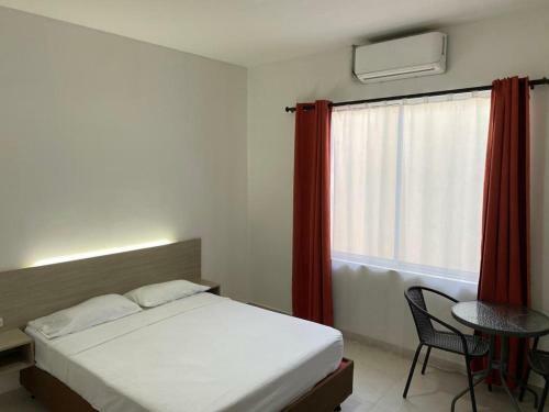 Encanto Apartahotel