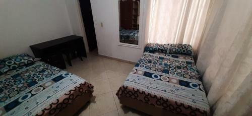 Casa Hostal Aromas. Habitaci�n Acomodacion Multiple