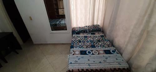 Casa Hostal Aromas. Habitaci�n Acomodacion Multiple