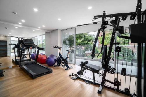 Apartamento H602 - Cozy Garden View, Fast Wifi & Rooftop Pool
