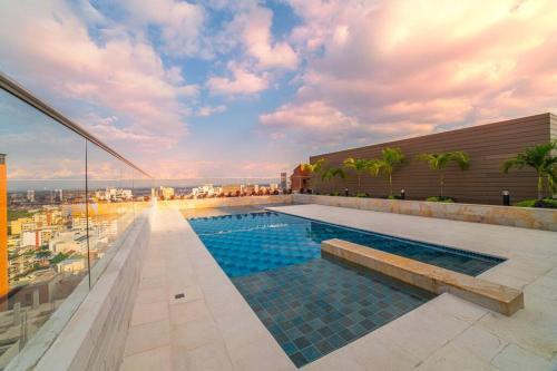 Apartamento H602 - Cozy Garden View, Fast Wifi & Rooftop Pool