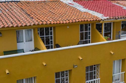 Magical And Colorful Apartment Inside The Walled City