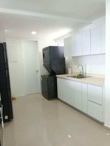 Apartamento Lovely 2-br Oceanfront Condo With Rooftop Pool