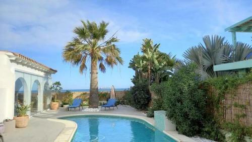 Villa En Primera Linea De Playa