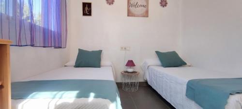 Tabarca Chalet Con Jard�n Y Piscina Comunitaria