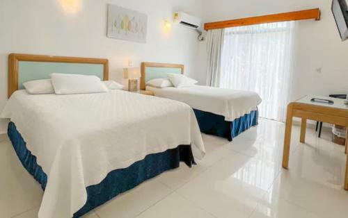 Hotel Cocoplum - Family Suite - Colombia