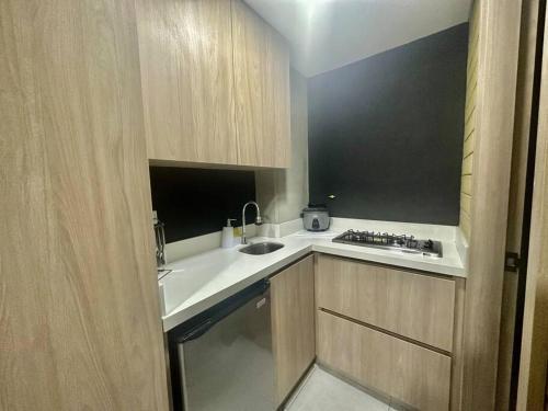 Apartamento Loft Belmont Suites (203)