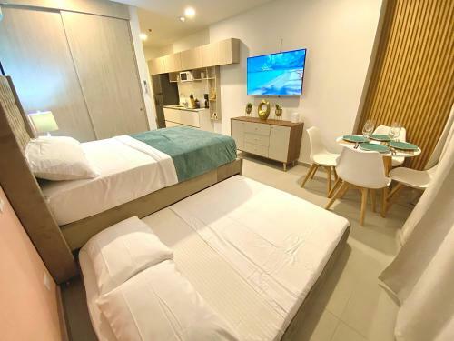 Apartamento Charming Suite / Pozos Colorados
