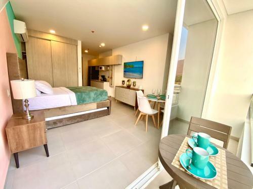 Apartamento Charming Suite / Pozos Colorados