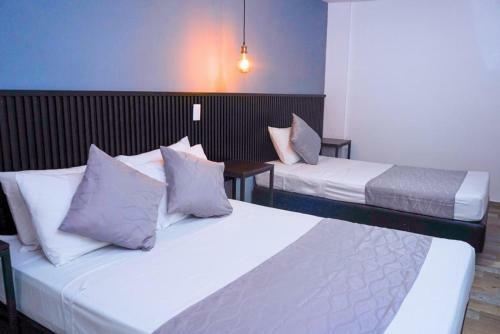 Palmas Del Estadio Hotel