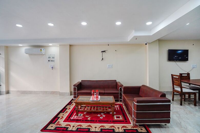 Fabhotel Ada Residency