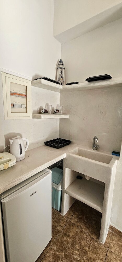Santorini Studios Pleasure By The Sea