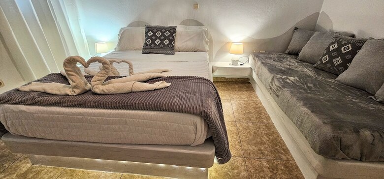 Santorini Studios Pleasure By The Sea