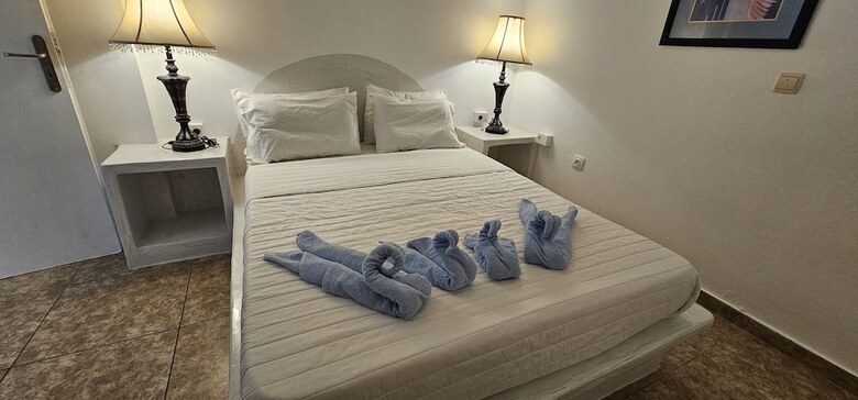 Santorini Studios Pleasure By The Sea