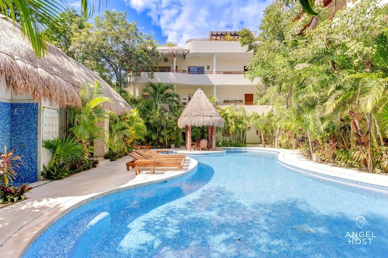Apartamentos Condo Complex With An Alluring Pool & Tropical Vibes By Stella Rentals