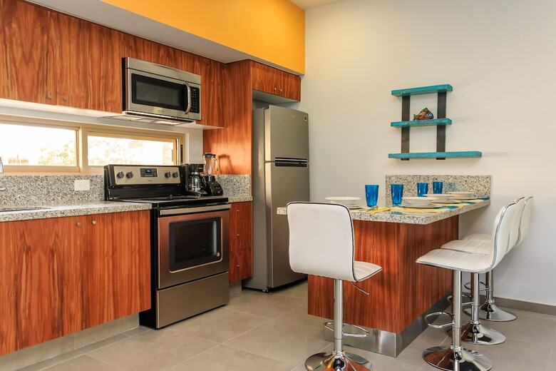 Apartamentos Condo Complex With An Alluring Pool & Tropical Vibes By Stella Rentals