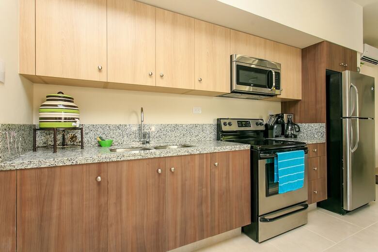Apartamentos Condo Complex With An Alluring Pool & Tropical Vibes By Stella Rentals