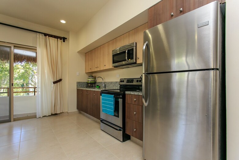 Apartamentos Condo Complex With An Alluring Pool & Tropical Vibes By Stella Rentals