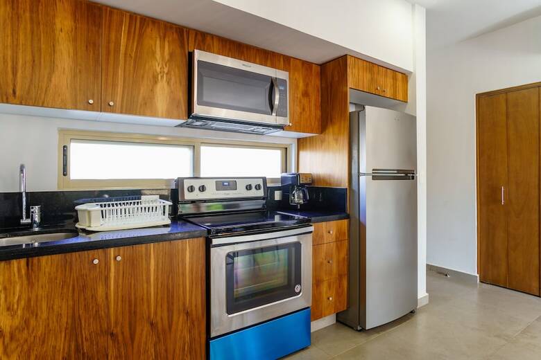 Apartamentos Condo Complex With An Alluring Pool & Tropical Vibes By Stella Rentals