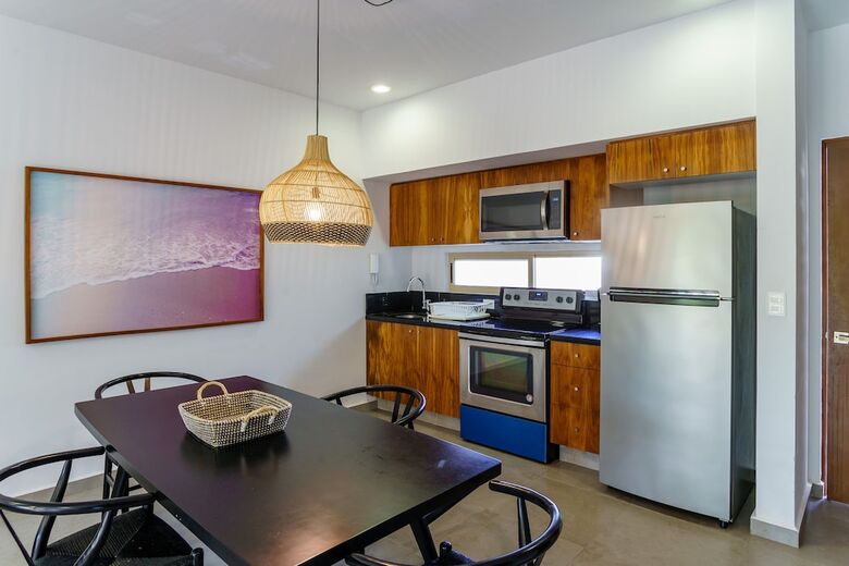 Apartamentos Condo Complex With An Alluring Pool & Tropical Vibes By Stella Rentals