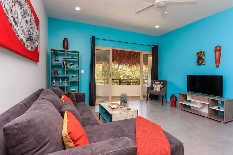 Apartamentos Condo Complex With An Alluring Pool & Tropical Vibes By Stella Rentals