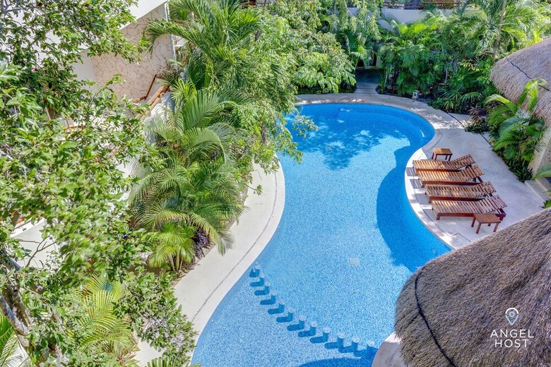 Apartamentos Condo Complex With An Alluring Pool & Tropical Vibes By Stella Rentals