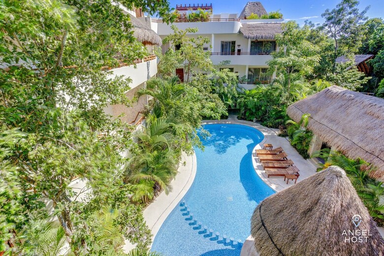 Apartamentos Condo Complex With An Alluring Pool & Tropical Vibes By Stella Rentals