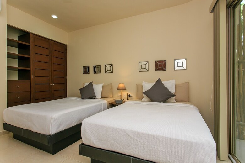 Apartamentos Condo Complex With An Alluring Pool & Tropical Vibes By Stella Rentals