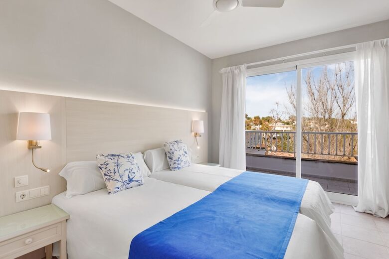 Flipflop Cala Mand�a Hotel