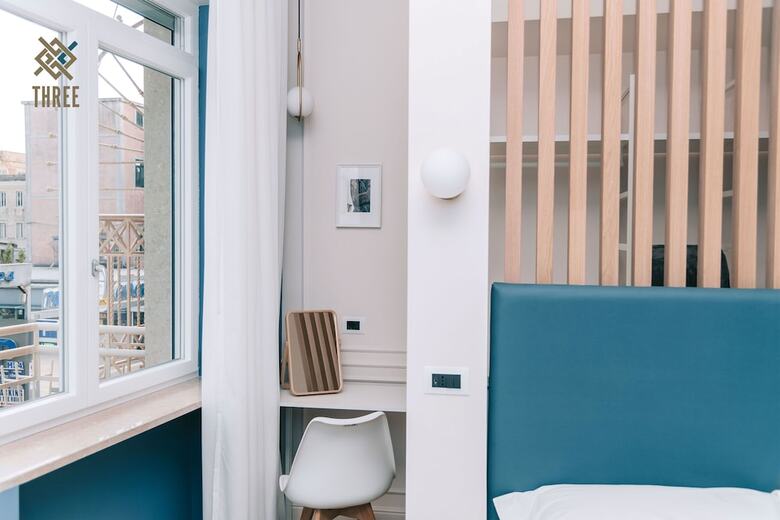 Four - Acanfora Suites