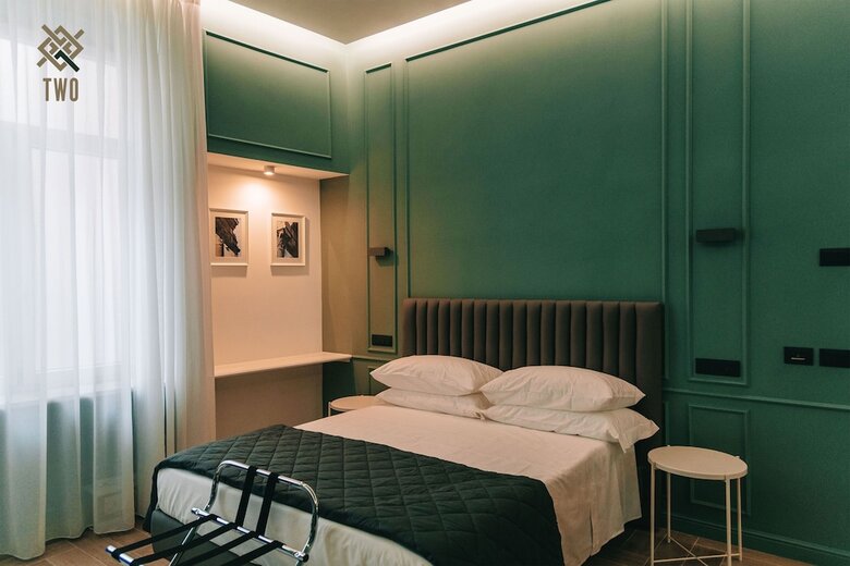 Four - Acanfora Suites