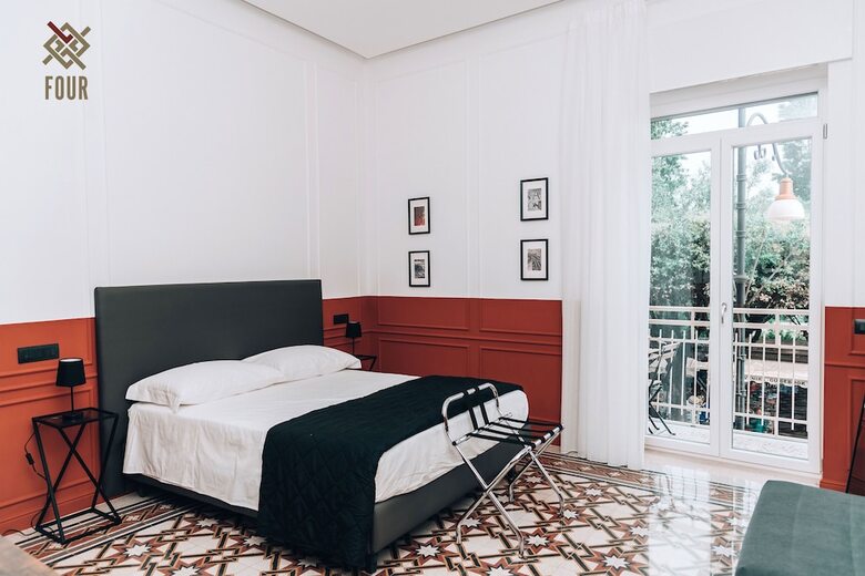 Four - Acanfora Suites