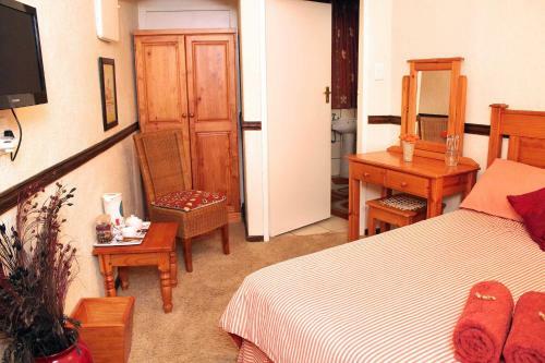 Hostal The Palms Guesthouse