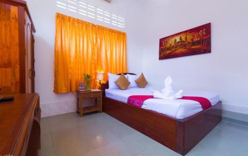 Hotel Blossoming Romduol Lodge