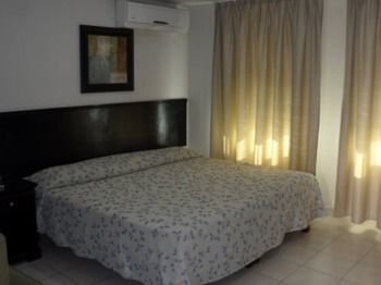 Boca Inn Suites & Hotel