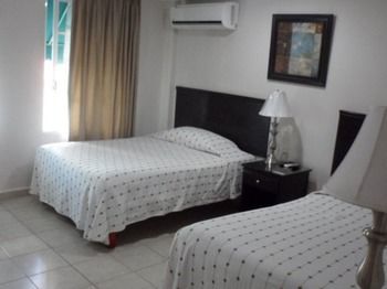 Boca Inn Suites & Hotel