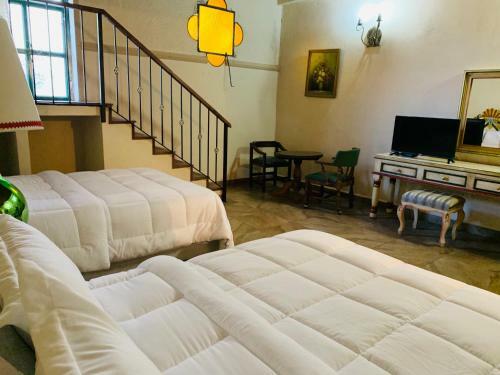 Apartamentos Hotel Posada La Ermita