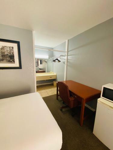 Motel Travelers Place Inn & Suites