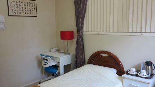 Hostal Pure Land Guest House