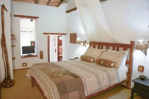 Hostal Old Thatch Lodge