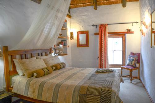 Hostal Old Thatch Lodge