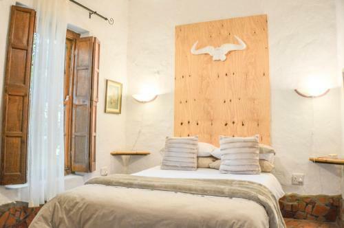 Hostal Old Thatch Lodge