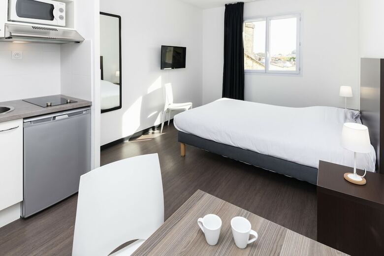 Residencia Teneo Suites