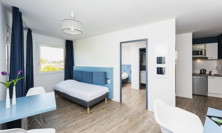 Residencia Teneo Suites