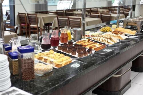 Apartamento Miotto Executive Hotel