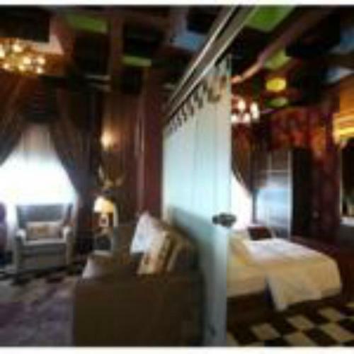 Apartamento Roomi Suites Hotel