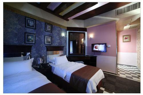 Apartamento Roomi Suites Hotel