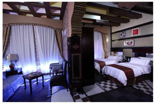 Apartamento Roomi Suites Hotel
