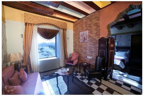 Apartamento Roomi Suites Hotel